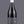Laden Sie das Bild in den Galerie-Viewer, Eine Flasche Vinosaurier Grau vor einem grauen Hintergrund. Die Flasche ist aus braunem Glas. Der Verschluss ist weiß. Das Etikett ist grau mit weißer Schrift.
