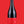 Laden Sie das Bild in den Galerie-Viewer, Eine Flasche Vinosaurier rot vor einem roten Hintergrund. Die Färbung der Flasche ist aufgrund der dunklen Farbe des Rotweins nicht zu kennen. Der Verschluss ist schwarz das Etikett ist rot mit weißer Schrift. 
